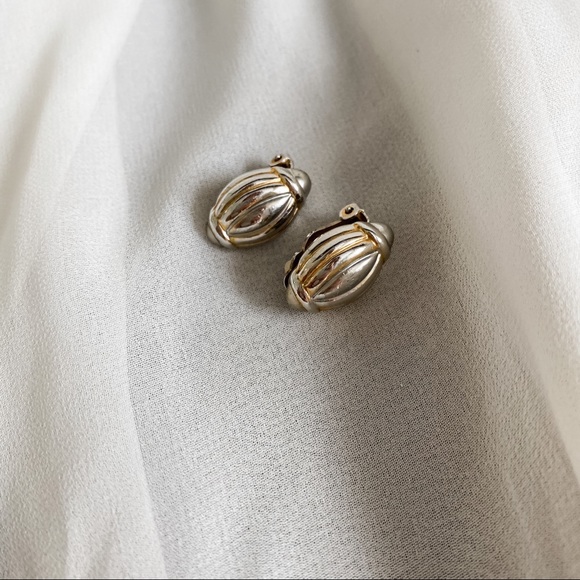 Vintage Jewelry - VTG Ribbed Football Almond Silver Clip Earrings